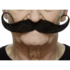 Mustasch, showman svart