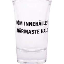 Snapsglas, töm innehållet i närmaste hals